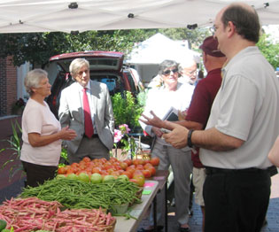 Photo of ARC Federal Co-Chair Earl Gohl and city and state officials at the Downtown Cumberland Farmers Market.