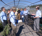 Photo of Maryland Jobs and Local Food Systems Tour participants at Frostburg State University's Grow It Local greenhouse on July 26, 2013.