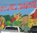 Buy local produce sign at Mississippi farmers market