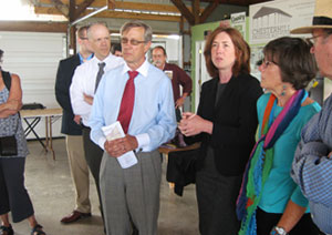 Photo of Ohio Jobs and Local Food Systems Tour participants at Chesterhill Produce Auction. Shown are Rural Action Executive Director Michelle Decker, ARC Federal Co-Chair Earl Gohl, and USDA Rural Development Acting Under Secretary Doug O'Brien.