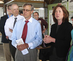 Photo of ARC Federal Co-Chair Earl Gohl and USDA Rural Development Acting Under Secretary Doug O'Brien listening to Rural Action Executive Director Michelle Decker.