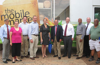 Photo of ARC Federal Co-Chair Earl Gohl and South Carolina state and local officials with the Hub City Farmers Market mobile market van in Spartanburg on July 11, 2013.