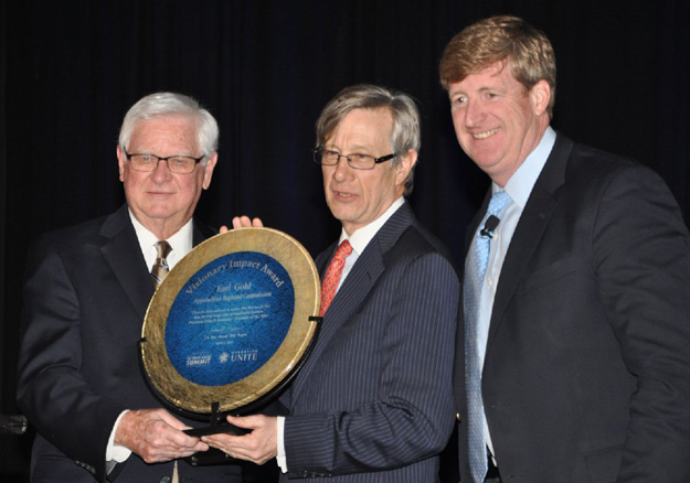 Photo of ARC Federal Co-Chair Earl Gohl receiving a 